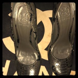 Grey Tory Burch snake print pumps.